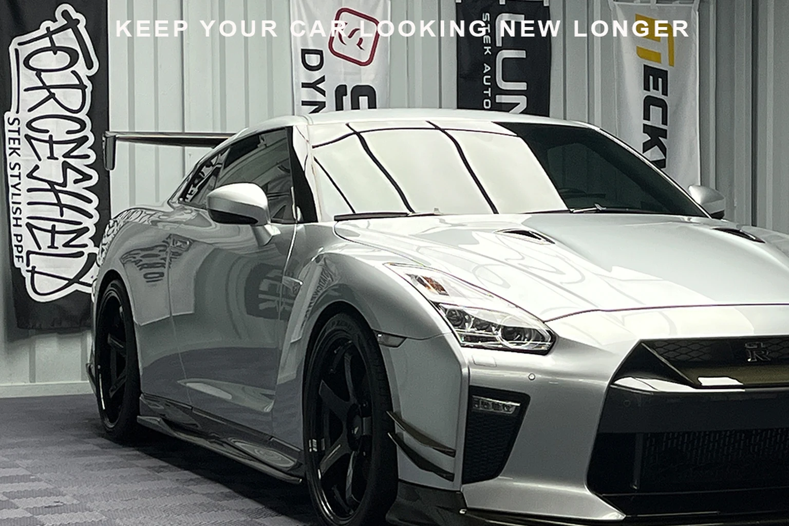 Silver XstaticWerkz performance coupe with a ceramic-coated finish